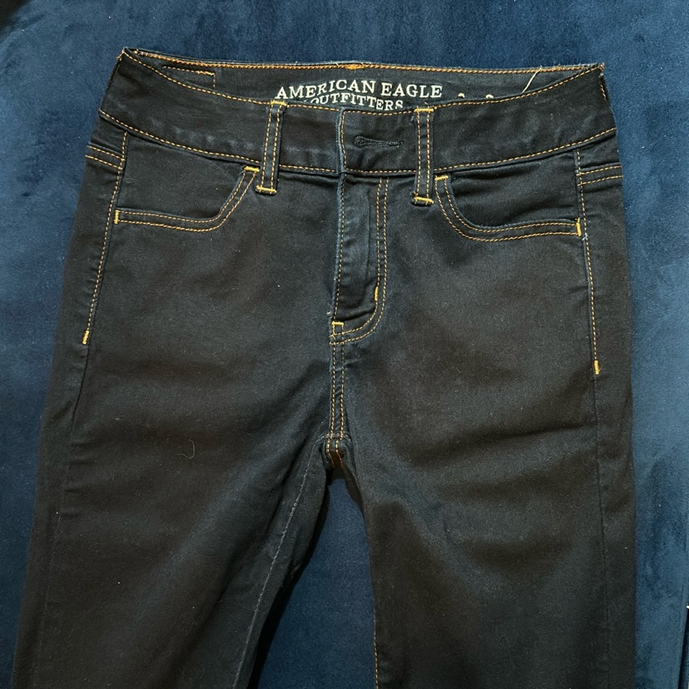 American Eagle high-rise, dark blue jagging super super stretch size 4